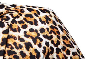 Close-up detail of bold leopard print fabric and stitching on a men's suit jacket
