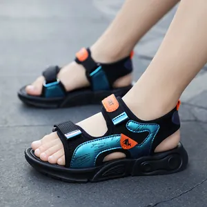 Breathable boys' summer sandals with metallic blue panels and soft non-slip soles