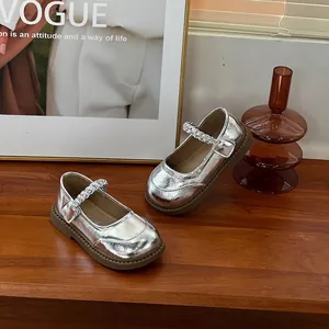 Silver metallic girl's Mary Jane princess shoes with braided strap and soft rubber sole