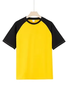 Detail view of a men's sport T-shirt with yellow body and black raglan sleeves.
