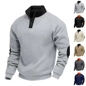 Men's quarter-zip sweatshirt detail showing color block collar and elbow patches
