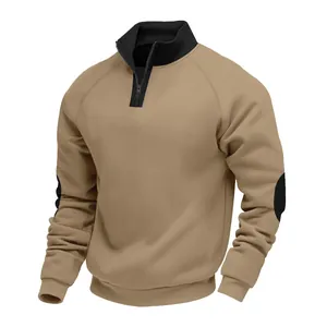 Detail view of khaki 1/4 zip sweatshirt with black stand collar and elbow patches