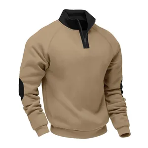 Detailed view of a khaki half-zip sweatshirt featuring a black stand collar and elbow patches