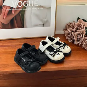 Chaussures Mary Jane élégantes pour filles avec nœuds papillon et semelles souples.