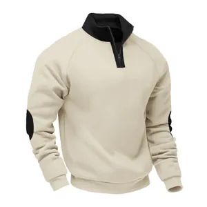 Detail view of a men's fleece-lined quarter-zip sweatshirt with black elbow patches