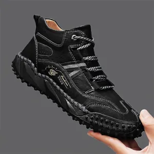 Detail of black leather outdoor boot with warm fleece lining and rugged sole