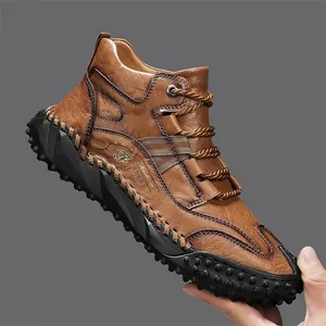Macro view of brown leather outdoor travel shoe with durable studded rubber sole