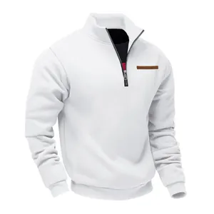 Detail view of a men's white half-zip sweatshirt with a sleek stand collar design
