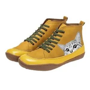 Comfortable yellow flat ankle boots featuring a realistic printed cat design with green laces