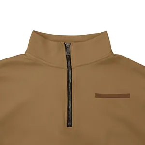 Close-up detail showing the metal zipper and stand collar of a mens camel brown sweatshirt
