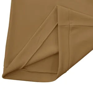 Macro detail of the soft inner fleece lining and hem stitching on a brown casual sweatshirt