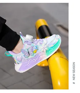 Profile view of girls' butterfly sports sneakers with iridescent panels and rotary dial