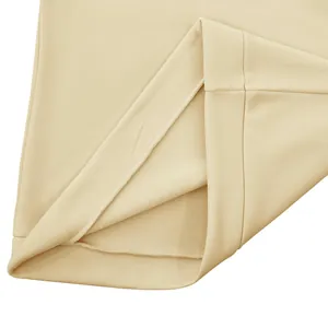 Macro view showing the soft fleece lining and high-quality stitching of the beige sweatshirt