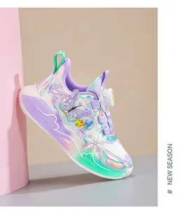 Close-up of holographic girls' sneakers featuring butterfly and snowflake details
