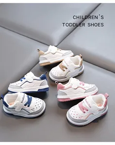 Detailed view of Xiaoliubao breathable toddler shoes in multiple colors on a soft mat