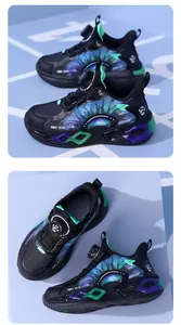 Detail of boys sneakers featuring cosmic pattern and easy rotary buckle closure