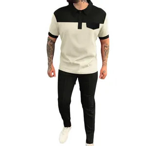 Stijlvolle wafelgebreide herenset met poloshirt en lange broek in beige en zwart