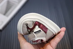 Flexible sole detail of toddler walking sneakers showing soft and bendable material
