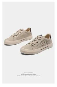 Stylish men's khaki low-top canvas sneakers with minimalist design and durable flat sole.