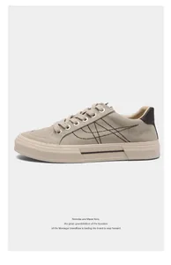 Khaki men's low-top canvas sneakers with elegant side stitching and rubber sole