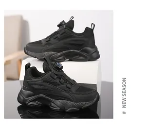 Detailed side view of black children's athletic sneakers featuring rotary knob lacing