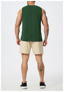 Back view of men's quick-dry green sports tank top and beige mesh shorts