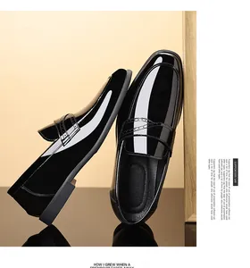 Detailed view of men's black patent leather loafers featuring a square toe and glossy finish