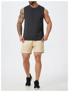 Full view of men's dark grey quick-dry sleeveless tank top with beige mesh shorts