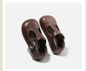 Classic brown leather T-strap shoes for girls with round toe and soft sole details