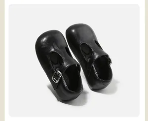 Elegant black girls' Mary Jane leather shoes with round toe and buckle strap detail