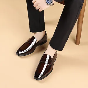 Elegant men's dark brown patent leather loafers featuring a classic square toe design