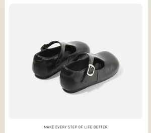 Detailed rear view of black Mary Jane shoes for girls with silver buckle strap