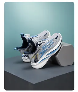Detailed side view of breathable kids sports shoes with modern rotary buckle closure.