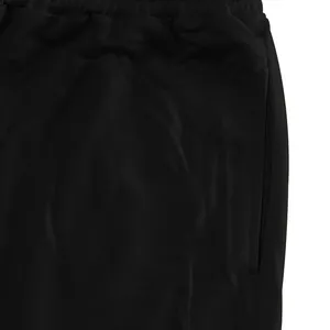 Macro view of black men's joggers showing breathable mesh fabric and side pocket detail