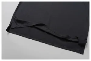 Close-up of the breathable mesh hem on a men's black quick-dry athletic vest.