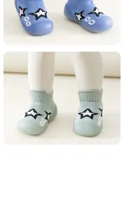 Detailed macro shot of soft-sole non-slip baby walking shoes with star patterns