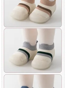 Detailed view of breathable mesh baby walking shoes with soft anti-slip rubber soles.