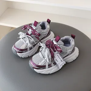 Fashionable kids' chunky sneakers with grey mesh and purple accents, breathable design