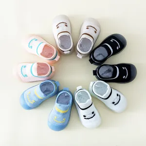 Chaussures de marche respirantes pour bébé avec semelles souples et motifs de smileys