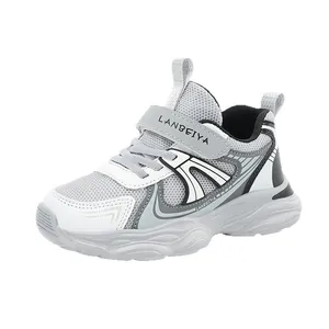 Breathable mesh children's sneakers in grey and white with non-slip sole and Velcro