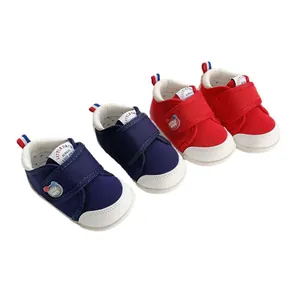 Zapatos de andar para bebé de suela blanda premium en colores azul marino y rojo de lona