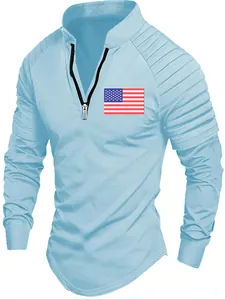 Detail of men's blue quarter-zip polo shirt with ribbed sleeves and US flag patch