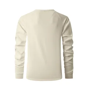 Back view detail of cream waffle knit long-sleeved Henley shirt with raglan sleeves