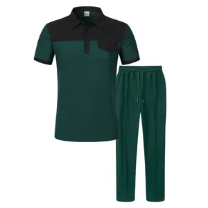 Completo uomo due pezzi in maglia a nido d'ape con polo color-block e pantaloni lunghi.