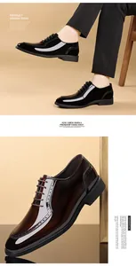 Nahaufnahme glänzender Lackleder-Business-Schuhe mit eleganten Brogue-Verzierungen.