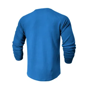 T-shirt blu a maniche lunghe in maglia a nido d'ape con maniche raglan, dettagli retro.