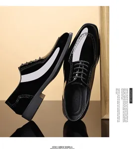 Detailansicht hochglänzender Lackleder-Herrenschuhe mit eleganten Brogue-Verzierungen