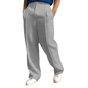 Pantalones deportivos grises holgados para hombre con cordón ajustable y pinzas de moda.