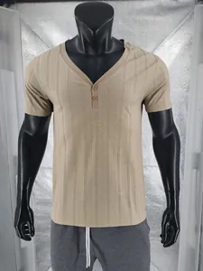 Detailed view of khaki Henley t-shirt with textured breathable fabric and V-neck