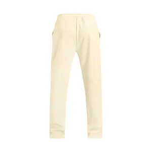 Vista trasera detallada de pantalones de chándal crema para hombre con cintura elástica